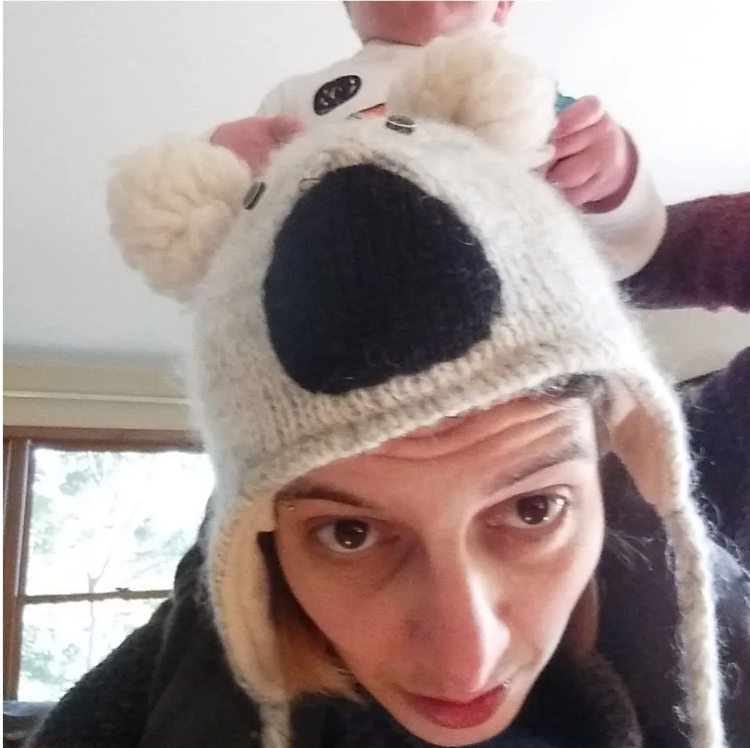 Photo of Susan wearing a koala head hat