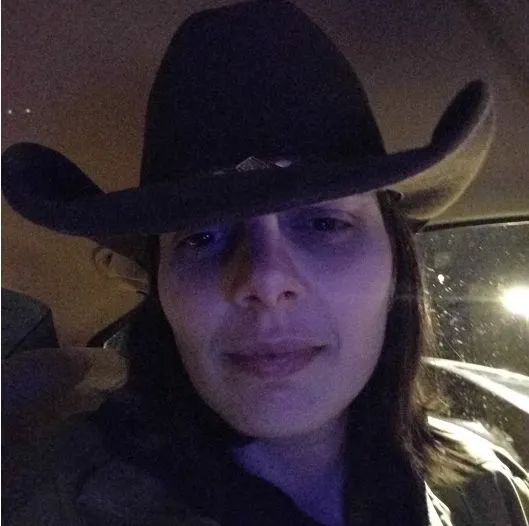 Photo of Susan wearing a cowboy hat